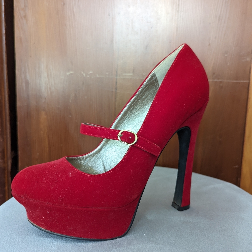 Red suede platform heels worn one time